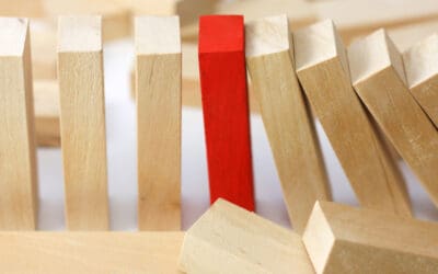 How Do I Deal with an Employed Spouse Who Causes Management Problems?